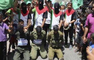 Hamas-supporters-enact-a-scene-simulating-the-abduction