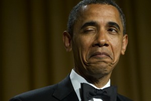US President Barack Obama winks as he te