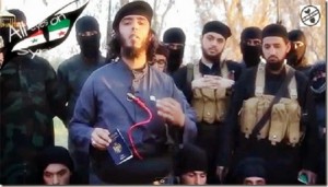 Jordanian ISIS terrorist wearing a suicide bomb belt and holding his Jordanian passport_thumb[1]