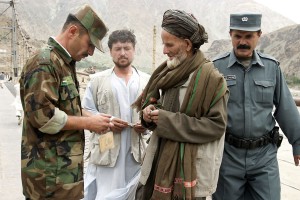 Afghans cross into Tajikistan at Kalaikhum. 2007.
