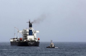 A general view taken on April 4, 2014 shows oil tanker Morning Glory, during the unloading of oil in the Libyan sea port of Zawiya. The US Navy SEALS handed the tanker over to Libyan authorities the previous month after they captured the tanker off Cyprus, in the eastern Mediterranean, when the vessel took to sea with crude illegally loaded at a rebel-held port in Libya. AFP PHOTO / MAHMUD TURKIA