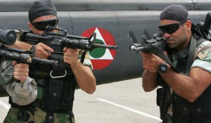 Lebanese Special Forces display their combat skills at the opening ceremony of the Security Middle East show in Beirut on April 20, 2009. The show, which ends on April 22, is a regional arms exhibition being staged in Lebanon for the first time. AFP PHOTO/ANWAR AMRO (Photo credit should read ANWAR AMRO/AFP/Getty Images)