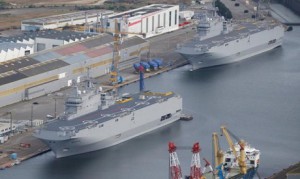The two Mistral-class helicopter carriers Sevastopol (L) and Vladivostok are seen at the STX Les Chantiers de l'Atlantique shipyard site in Saint-Nazaire, western France, May 25, 2015. REUTERS/Stephane Mahe