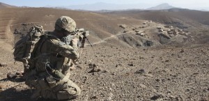 U.S. Army soldier provides security for infantry patrolling through Dandarh village, Afghanistan.