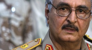 Then-General Khalifa Haftar speaks during a news conference at a sports club in Abyar, east of Benghazi May 21, 2014. Growing frustration over the reality of life in eastern Libya, which contrasts with the promises of politicians, is feeding support for Haftar, who has set himself up as a warrior against Islamist militancy and who some also see as their saviour.  Picture taken May 21, 2014.     REUTERS/Esam Omran Al-Fetori (LIBYA - Tags: CIVIL UNREST POLITICS MILITARY) - RTR4QLUB