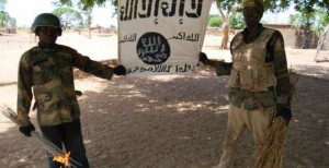 Some-soldiers-displaying-Boko-Haram-flag-after-capturing-their-camps-in-Sambisa-Forest